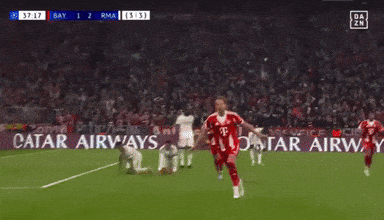 A Soccer Player Is Running On The Field With A Qatar Airways Ad In The Background GIF