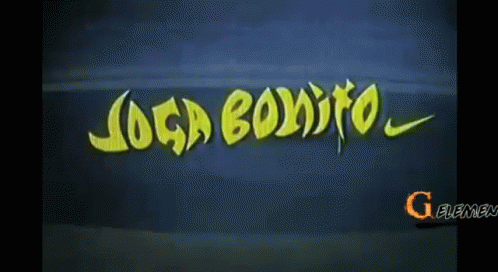 A Soccer Player Is Sitting On The Field Wearing A Yellow Jersey With The Letter G On The Sleeve GIF