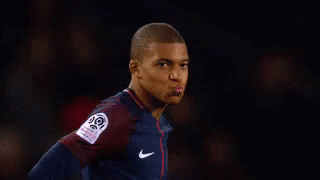 A Soccer Player Is Standing In Front Of A Sign That Says I Know . GIF