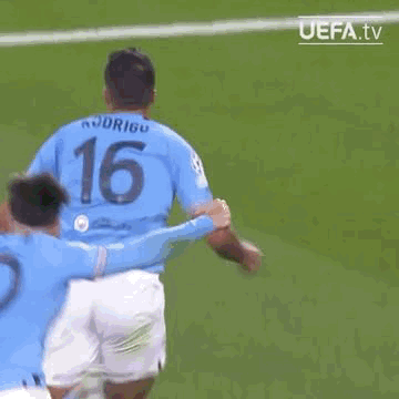 A Soccer Player Is Standing In The Corner Of A Soccer Field With His Arms Outstretched . GIF