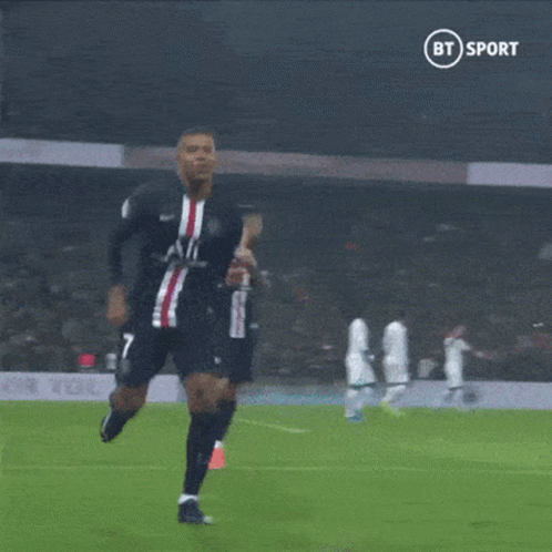 A Soccer Player Is Taking A Picture Of Himself On The Field GIF