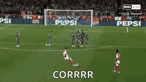 A Soccer Player Kicking A Ball With The Word Corrr Written Below Him GIF