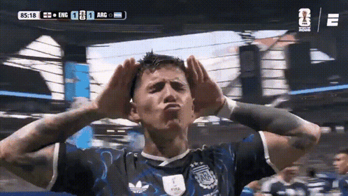 A Soccer Player Making A Face With His Hands On His Head During A Match Between England And Argentina GIF