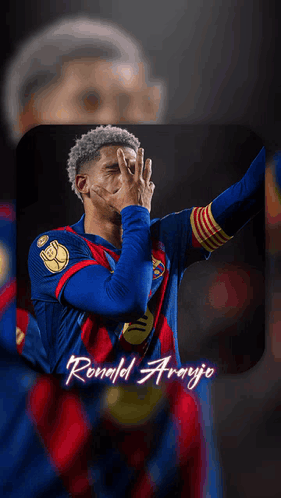 A Soccer Player Named Ronald Araujo Is Wearing A Blue And Red Jersey GIF