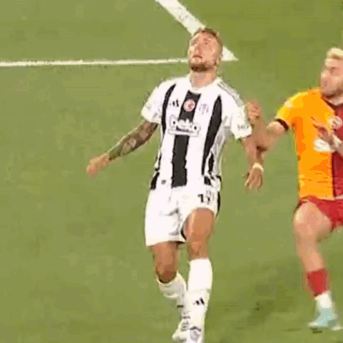 A Soccer Player Wearing A Beko Jersey Kicks A Ball GIF