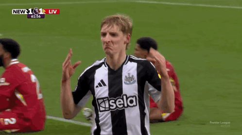 A Soccer Player Wearing A Black And White Jersey That Says Igol GIF