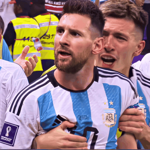 A Soccer Player Wearing A Blue And White Jersey With The Number 7 On It GIF