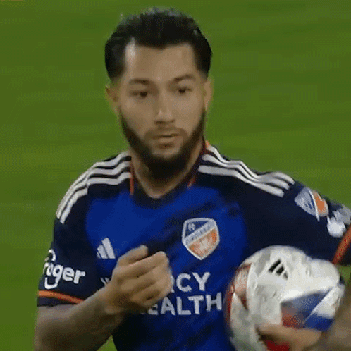 A Soccer Player Wearing A Blue Jersey That Says Cy Health On It GIF