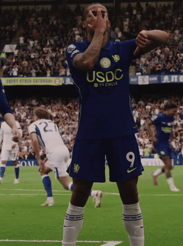 a soccer player wearing a blue jersey that says usdc