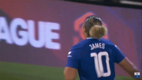 A Soccer Player Wearing A Blue Jersey With The Number 10 On The Back GIF
