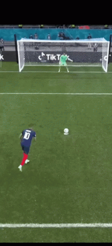 A Soccer Player Wearing A Blue Jersey With The Number 10 On The Back GIF