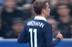 A Soccer Player Wearing A Blue Jersey With The Number 11 On It GIF