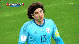 A Soccer Player Wearing A Blue Jersey With The Number 13 GIF