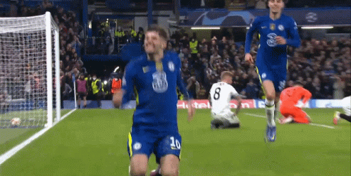 A Soccer Player Wearing A Blue Jersey With The Number 20 On It GIF