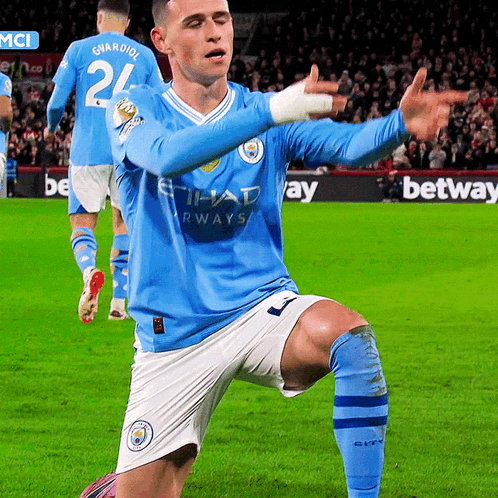A Soccer Player Wearing A Blue Jersey With The Number 24 On It GIF