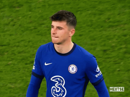 A Soccer Player Wearing A Blue Jersey With The Number 3 On It GIF
