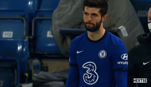 a soccer player wearing a blue jersey with the number 3 on it