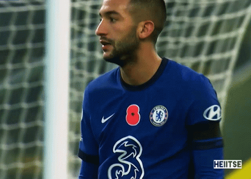 A Soccer Player Wearing A Blue Jersey With The Number 3 On It GIF