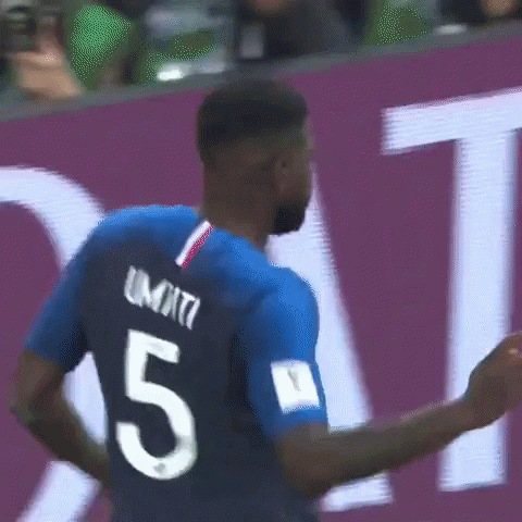 A Soccer Player Wearing A Blue Jersey With The Number 5 On The Back GIF