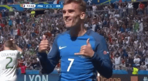 A Soccer Player Wearing A Blue Jersey With The Number 7 On It GIF