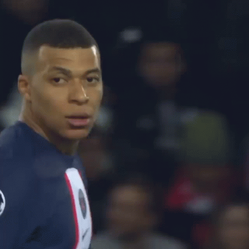 A Soccer Player Wearing A Blue Jersey With The Number 7 On The Back GIF