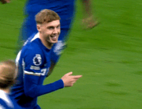 A Soccer Player Wearing A Blue Jersey With The Word Ultimate On It GIF