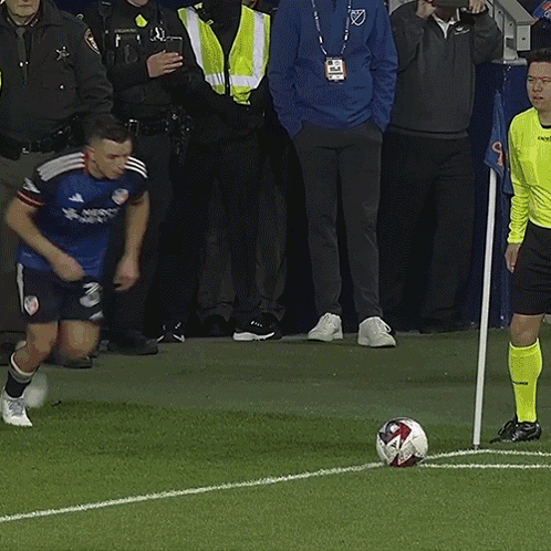 A Soccer Player Wearing A Blue Jersey With The Word United On It GIF