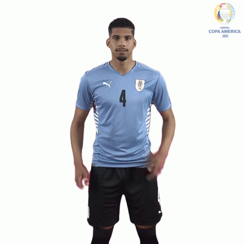 A Soccer Player Wearing A Blue Number 4 Jersey GIF