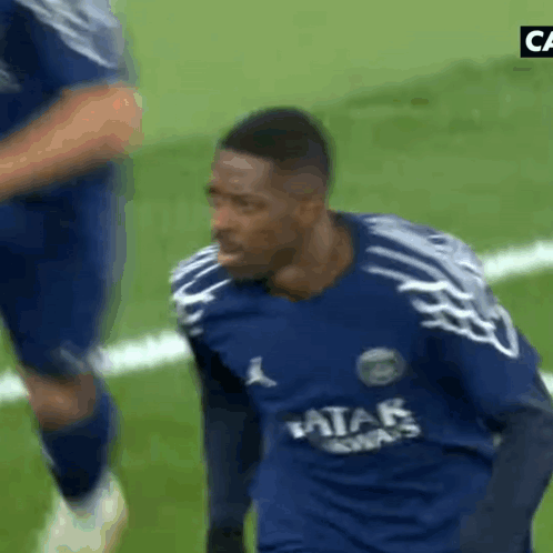 A Soccer Player Wearing A Blue Shirt That Says Qatar Airways GIF