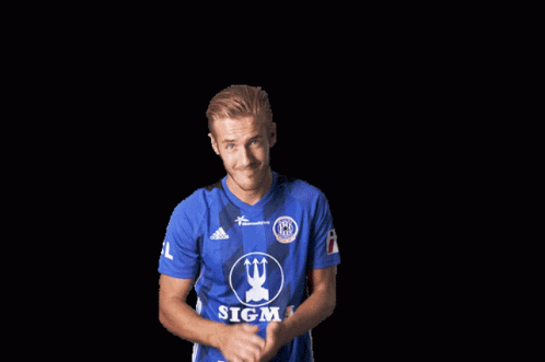 A Soccer Player Wearing A Blue Shirt That Says Sigma On It GIF