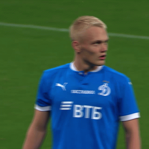 A Soccer Player Wearing A Blue Shirt With Btb On The Front GIF