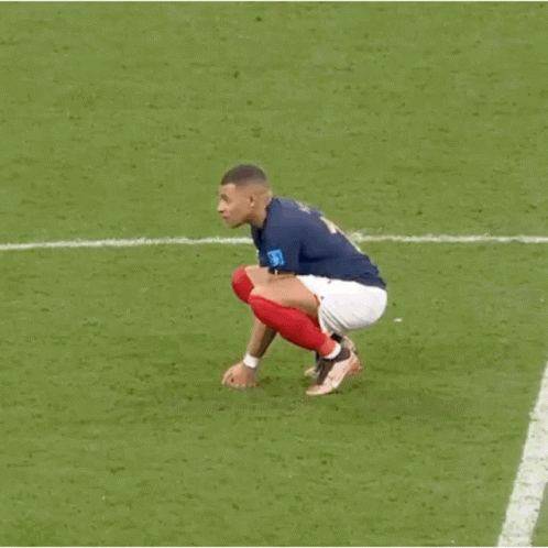 A Soccer Player Wearing A Blue Shirt With The Number 10 On It Is Standing On A Field . GIF