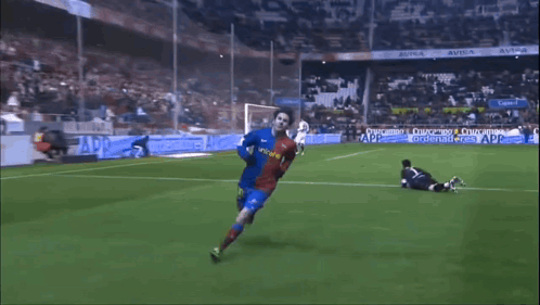 A Soccer Player Wearing A Blue Unicef Jersey Stands On The Field GIF