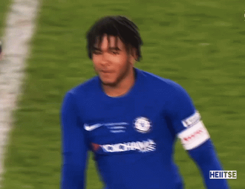 A Soccer Player Wearing A Blue Yokohama Jersey GIF