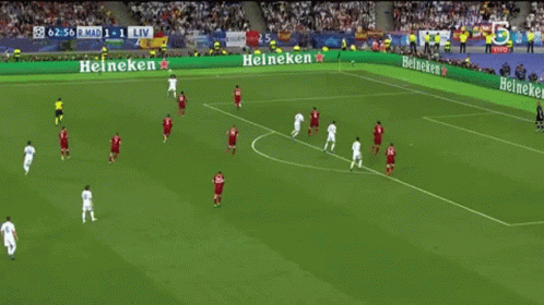 A Soccer Player Wearing A Fly Emirates Jersey Is Celebrating A Goal GIF
