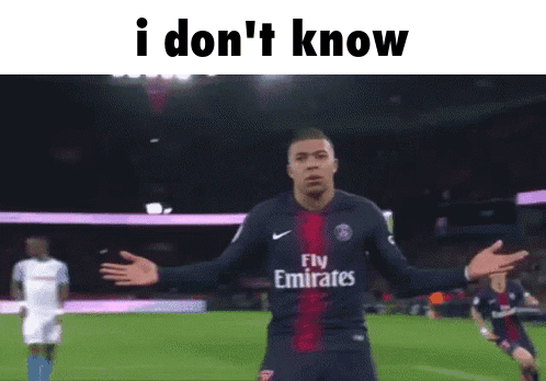 A Soccer Player Wearing A Fly Emirates Jersey Stands On A Field GIF