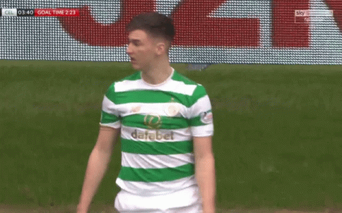 A Soccer Player Wearing A Green And White Jersey That Says Dafabet On It GIF