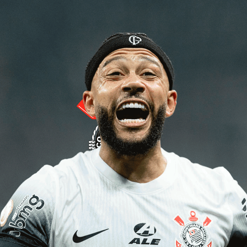 a soccer player wearing a headband that says bmg