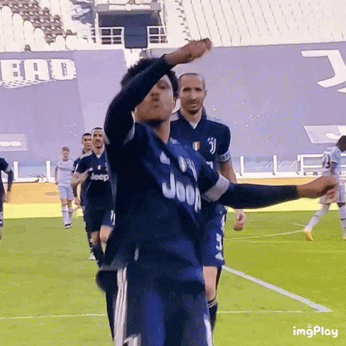 A Soccer Player Wearing A Jeep Jersey Stands On The Field GIF