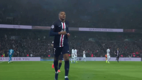 A Soccer Player Wearing A Jersey That Says All Is Celebrating GIF