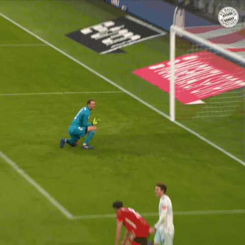 a soccer player wearing a jersey that says ' bayern munchen ' on it
