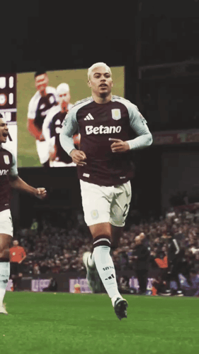 A Soccer Player Wearing A Jersey That Says Betano On It GIF