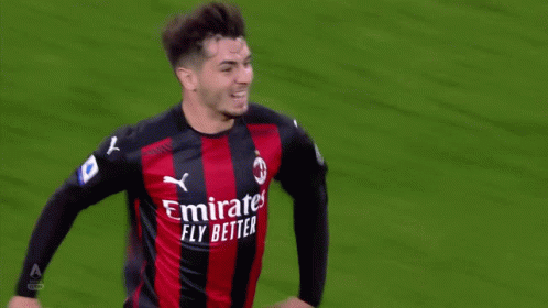 A Soccer Player Wearing A Jersey That Says ' Emirates Fly Better ' GIF