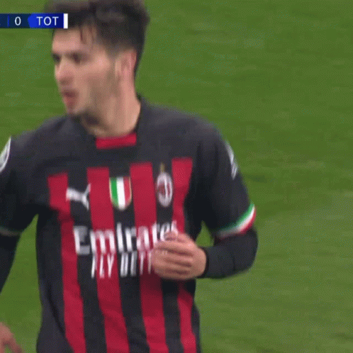 A Soccer Player Wearing A Jersey That Says Emirates Fly Better On It GIF