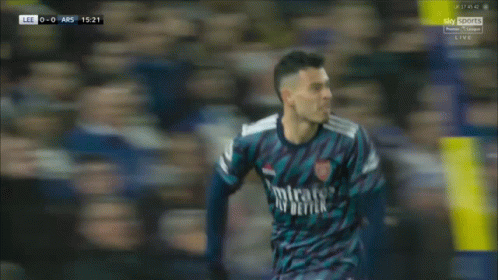 a soccer player wearing a jersey that says fly better on it