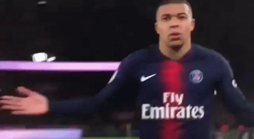 A Soccer Player Wearing A Jersey That Says Fly Emirates On It GIF