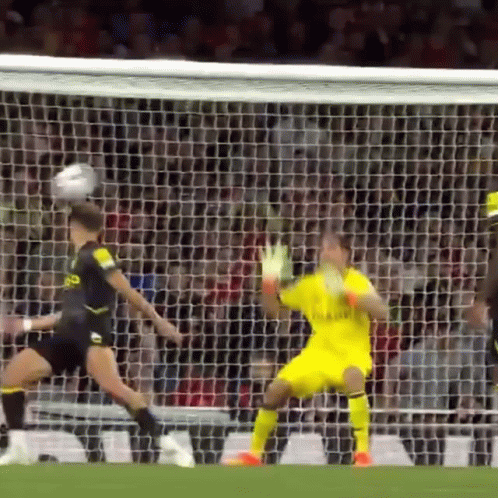 A Soccer Player Wearing A Jersey That Says Fly Emirates GIF