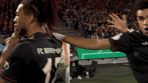 A Soccer Player Wearing A Jersey With The Number 11 On It GIF