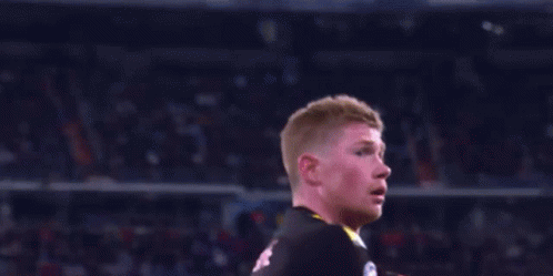 A Soccer Player Wearing A Jersey With The Number 12 On It GIF