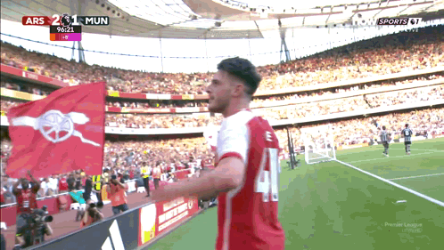 A Soccer Player Wearing A Jersey With The Number 14 On It GIF